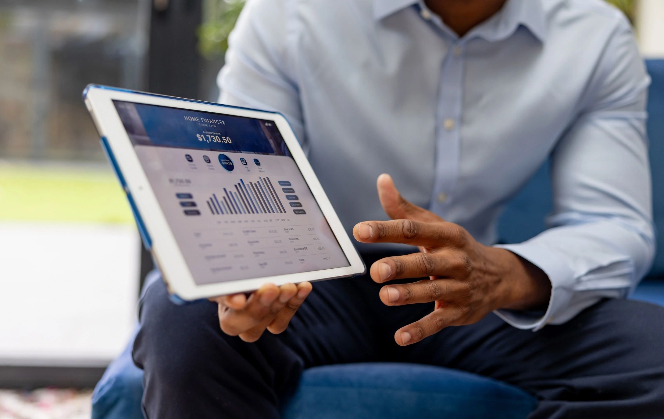 Financial analysis on a tablet and documents