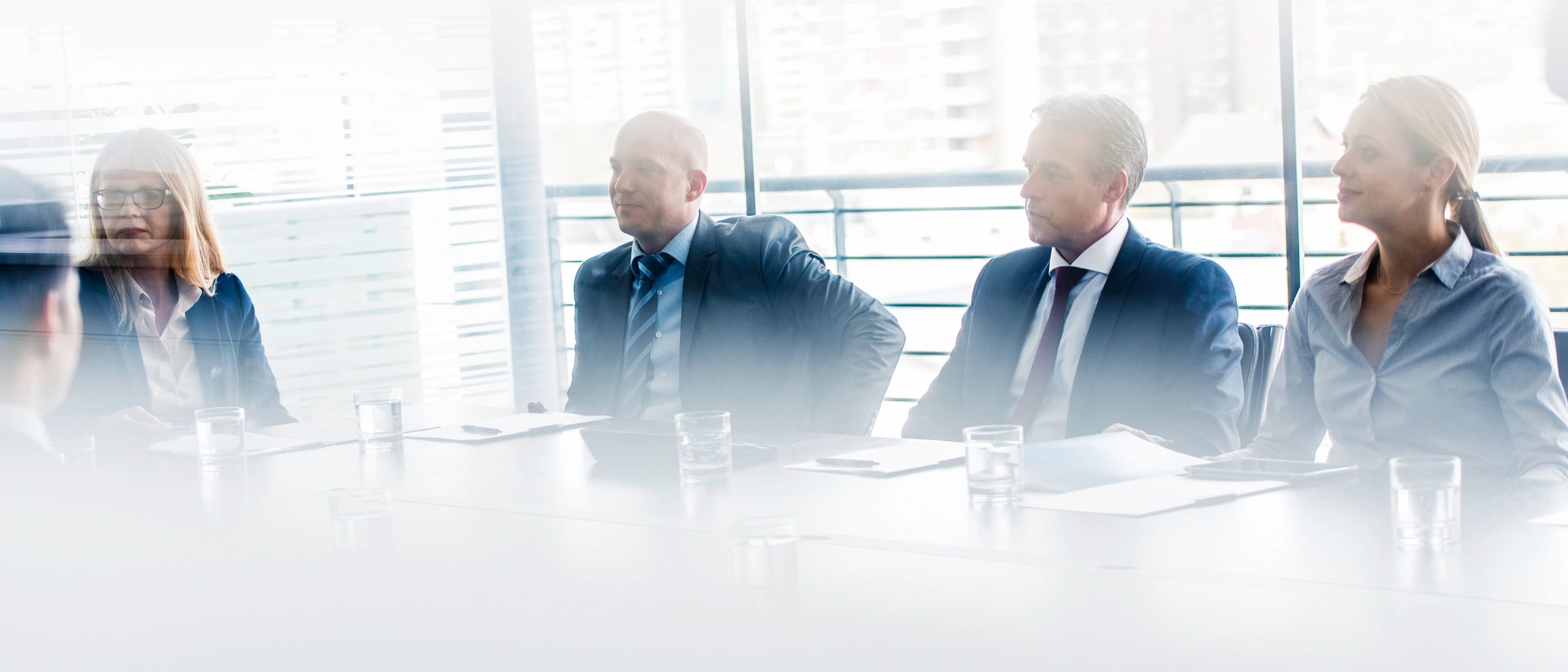 Consultants meeting in an office setting